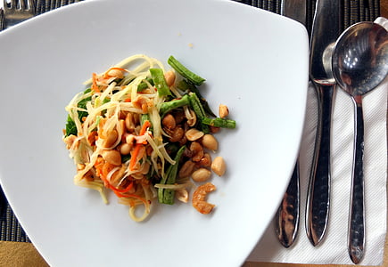 flat lay photography of nuts with stringbeans thumbnail