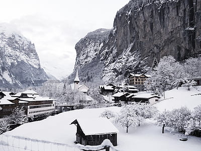 photo of mountain range beside houses thumbnail