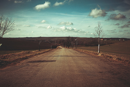 grey road during daytime thumbnail