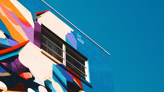 multicolored high rise building at daytime thumbnail