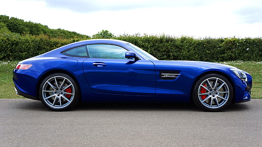 blue Mercedes-Benz AMG GT coupe parked during daytime thumbnail