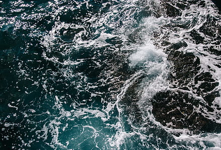waves on body of water thumbnail