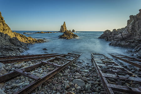 metal ladders on seashore thumbnail