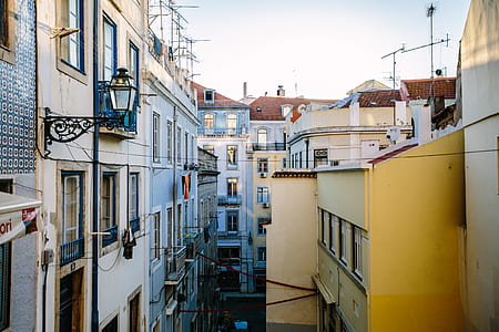 white and yellow concrete buildings thumbnail