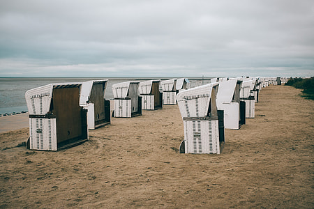 Empty strandkorb beach-chairs thumbnail