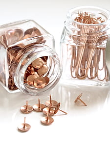 close-up photography of brass-colored thumb tacks thumbnail