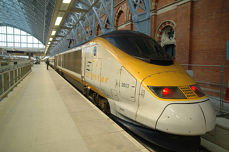 person standing in front of train thumbnail