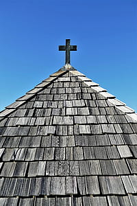 black cross finial under blue skeis thumbnail