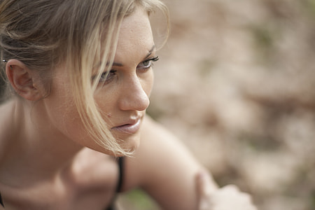 woman wearing black spaghetti strap top thumbnail