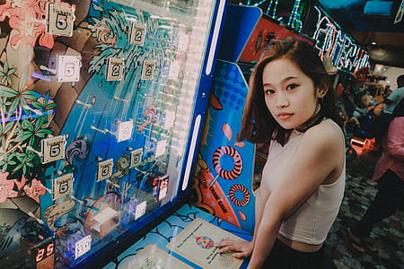woman standing infront of blue and white counter thumbnail