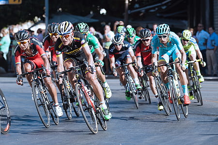 cyclists cycling on road thumbnail