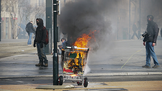 burning shopping cart on road thumbnail