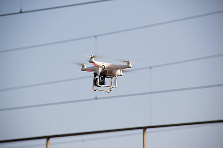 macro photo of drone on middle of air at daytime thumbnail