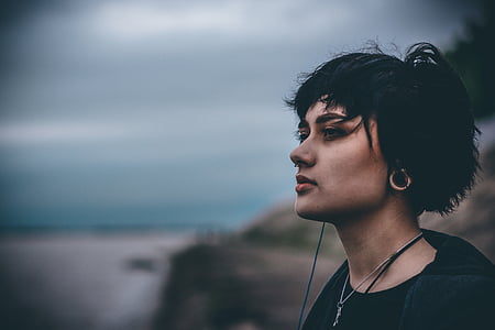 woman wearing black crew-neck top thumbnail