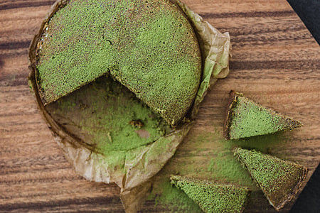 Delicious homemade matcha cake on a wooden board thumbnail