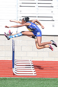 woman jumping on fence thumbnail