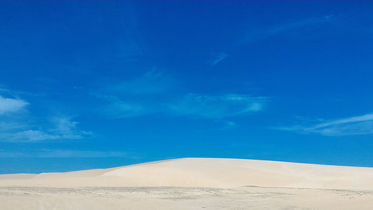desert under white clouds thumbnail