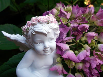angel statue and purple flowers thumbnail