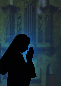 silhouette photo of woman praying thumbnail