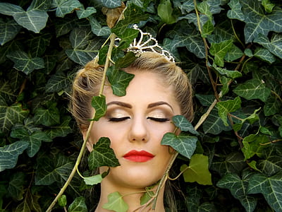 woman wearing silver-colored tiara thumbnail