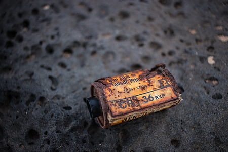 brown rusted case on black surface thumbnail