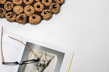 black framed eyeglasses near cookies thumbnail