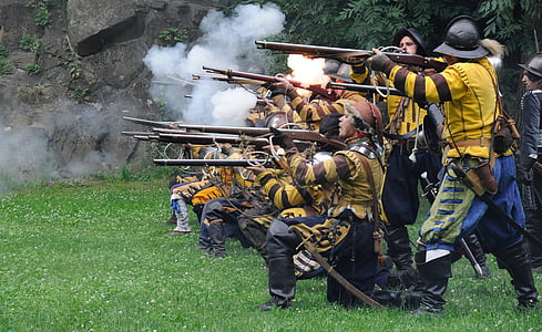 group of men holding rifles thumbnail
