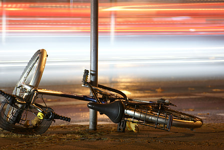 black bike near gray post thumbnail
