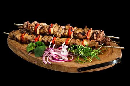 kebab barbecues on brown wooden tray thumbnail