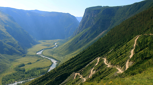 aerial photography of green field mountain thumbnail