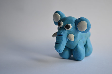blue elephant clay mold on white surface thumbnail