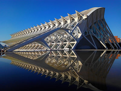architectural photograph of metal structure on body of water thumbnail