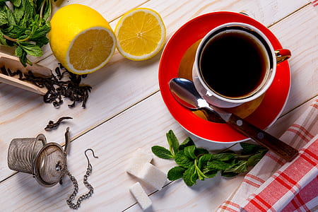 sliced lemon, sugar cubes, and tea thumbnail