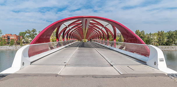 long-exposure photo of red and white suspension bridge thumbnail