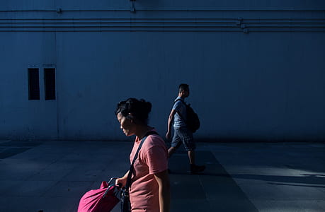 woman wearing pink t-shirt thumbnail