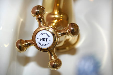 gold-colored accessory close-up photo thumbnail