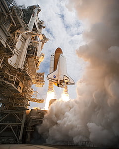 low angle-view of launching NASA shuttle spaceship thumbnail