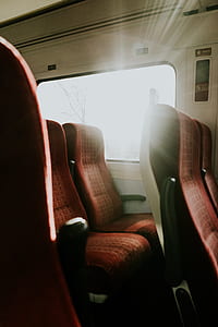 red and black train seats thumbnail