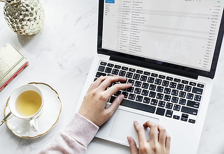 person using laptop computer thumbnail