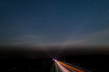 timelapse photo of a road with cars thumbnail
