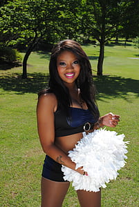 woman wearing black and blue sleeveless crop top thumbnail
