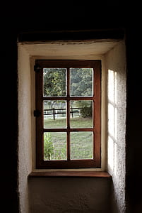 closed brown wooden 6-pane window thumbnail