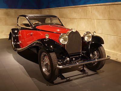 photo of classic red and black car thumbnail