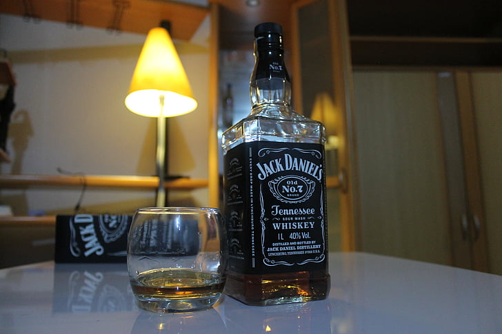 almost empty Jack Daniels whisky bottle