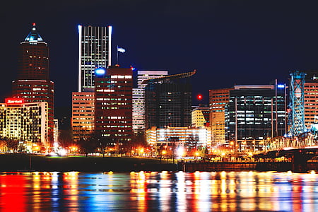 high rise buildings during night time thumbnail