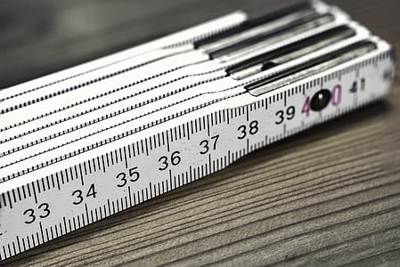 white wooden ruler in selective focus photography thumbnail