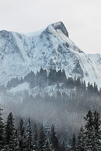 mountains with snow during daytime thumbnail
