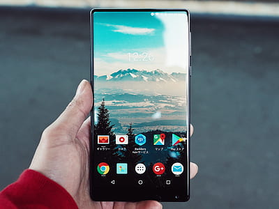 person holding black Android smartphone thumbnail
