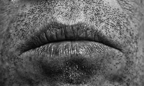 grayscale photo of lips thumbnail