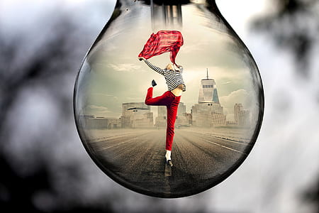 water drop photo of woman wearing red pants thumbnail